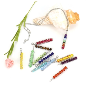 Handmade chakra pendant necklace with wire-wrapped colorful natural stones and metal chain