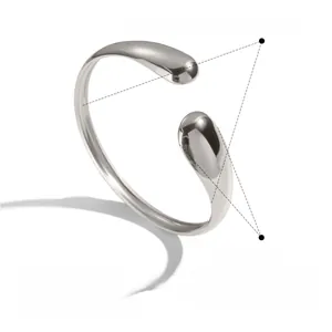 Minimalist stainless steel open bangle showing dimensions and hypoallergenic material details
