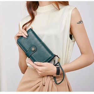 Detail of RFID oil wax leather long wallet with retro metal buckle and wrist strap