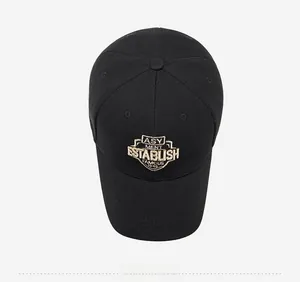 Top view of black cotton baseball cap featuring detailed gold shield embroidery