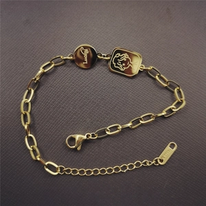 Golden stainless steel lucky angel bracelet with engraved round lucky and girl pendants