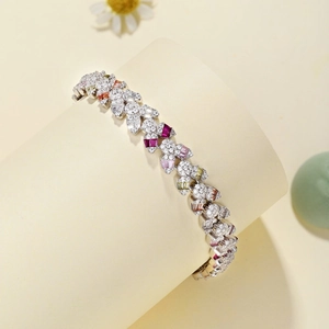 Detail of S925 sterling silver bracelet with colorful zircons on a jewelry stand