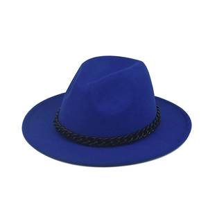 Detail of royal blue wool fedora hat featuring a stylish thick black chain decoration