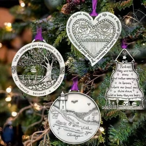 Silver Tree of Life memorial metal pendants hanging as festive Christmas tree decorations