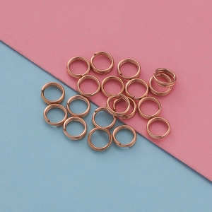 Macro shot of rose gold stainless steel jump rings for DIY jewelry making and crafts