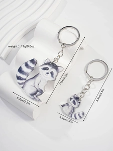 Detailed size and weight information for the raccoon acrylic keychain duo with measurements
