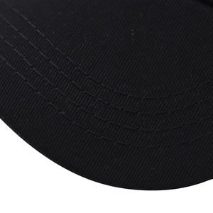 Detail of black cotton baseball cap showing reinforced brim and neat parallel stitching