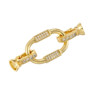 Macro shot of 18K gold plated jewelry connector clasp with sparkling zircon inlay