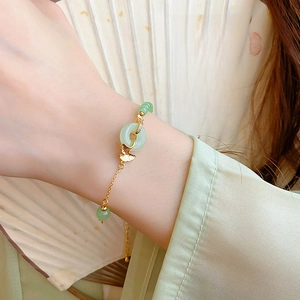 Bracelet élégant en forme de feuille de ginkgo dorée avec perles de jade vert