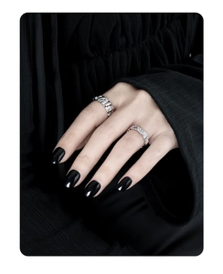 Close-up of S925 sterling silver geometric textured ring worn on model's finger