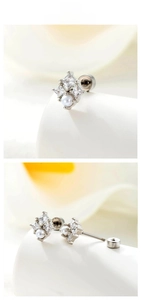 Detailed view of silver zircon stud earrings with pearl and secure screw back closure