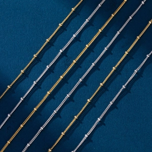 Macro detail of high-quality s925 silver beaded bracelets in gold and silver finishes