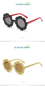 Side view of flower-shaped children's sunglasses in black, red and yellow frames