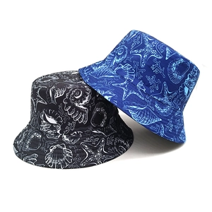 Black and blue bucket hats with marine life prints like starfish and corals