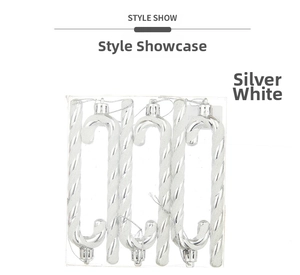 Detail view of silver candy cane ornaments with white glitter in a transparent box