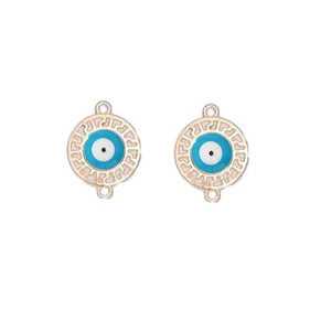 Macro shot of evil eye charms with Greek key patterns and golden finish for jewelry