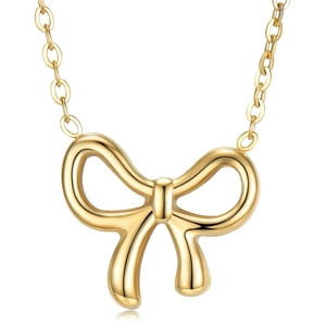 Minimalist golden bow pendant necklace with fine chain for women on white background