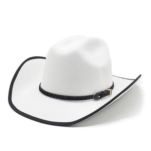 Detail of white western cowboy hat with black trim and faux leather decorative band