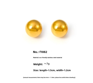 Detailed view of polished gold stainless steel ball earrings with 1.5cm x 1.2cm dimensions