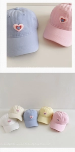 Detail of heart embroidery and color variety of washed cotton baseball caps