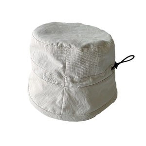Breathable summer beige fisherman bucket hat with drawstring and square logo patch