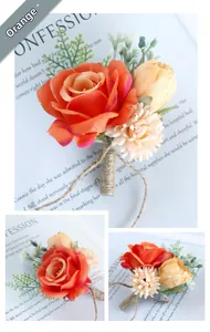 Detailed close-up of handmade orange rose boutonniere with rustic twine wrapping