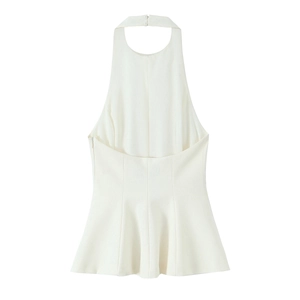 Detailed flat lay of white halter top with ruffle hem and smooth fabric texture
