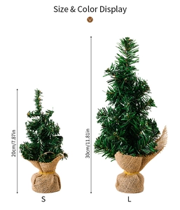 Size comparison of mini artificial Christmas trees with burlap bases in 20cm and 30cm