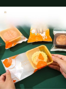 Frosted food packaging bag with floral rabbit prints and clear plastic tray for mooncakes
