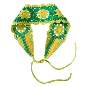 Detailed macro of handmade crochet sunflower headband with intricate bohemian stitching
