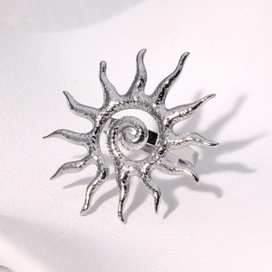 Silver stainless steel sun spiral ring with vintage hammered texture and open band design