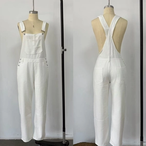 Front and back view of white denim overalls with large pockets and adjustable straps