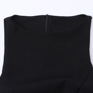 Slim fit black mini dress with invisible zipper and elegant neckline detail