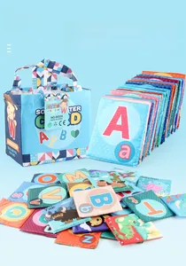 Detail of 26 alphabet cloth flashcards and storage bag showing soft washable fiber texture