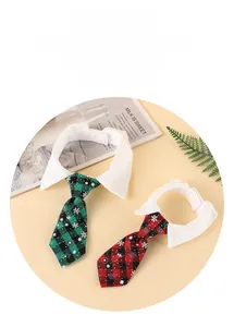 Detail of elegant adjustable pet neckties with snowflake patterns and white formal collars