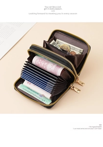 Detailed interior of dark brown accordion wallet with dual zippers and multi-card slots