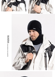 Close-up of black cable knit hat and neck warmer set with thick winter thermal fleece