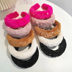Faux mink fur headbands in various colors including solid and pearl embellished styles