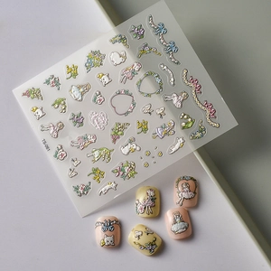 Autocollants nail art 5D avec reliefs de fleurs, rubans et motifs de dessins