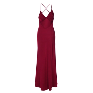 Detail view of wine red maxi dress featuring cross back straps and waist cut-out design