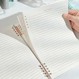 Minimalist B5 loose-leaf notebook with replaceable lined paper and flexible ring binder
