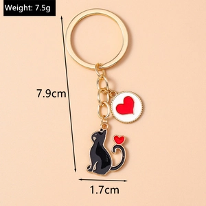 Detailed size map of cat and heart keychain showing 7.9cm length and 7.5g weight info