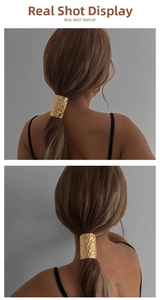 Detail of golden hammered texture hair ring for low ponytail hairstyles