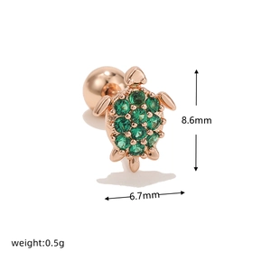 Macro detail of turtle earring in rose gold with green cubic zirconia and dimensions