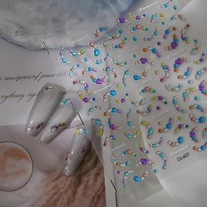 Blush style 3D nail stickers with colorful rhinestones on cat eye nails