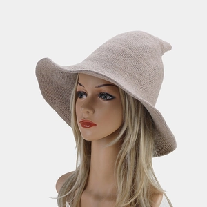Foldable pointed witch hat for Halloween in oat beige chunky knit with wavy brim