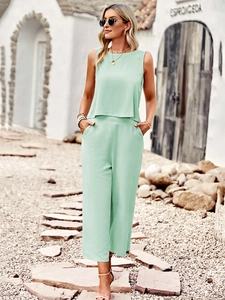 Women mint green two-piece linen set with sleeveless top and wide-leg cropped trousers