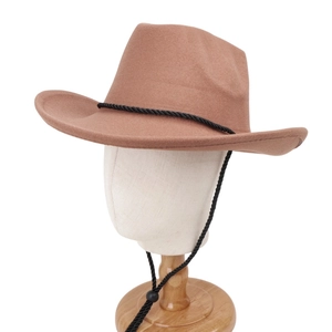 Detail of wool felt wide brim hat with adjustable black braided chin strap on a mannequin