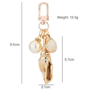 Cartoon ocean seashell keychain with tassel, gold shell pendant and pearl for bags