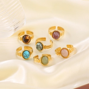 Set of vintage gold-plated stainless steel open rings with oval natural stone inlays